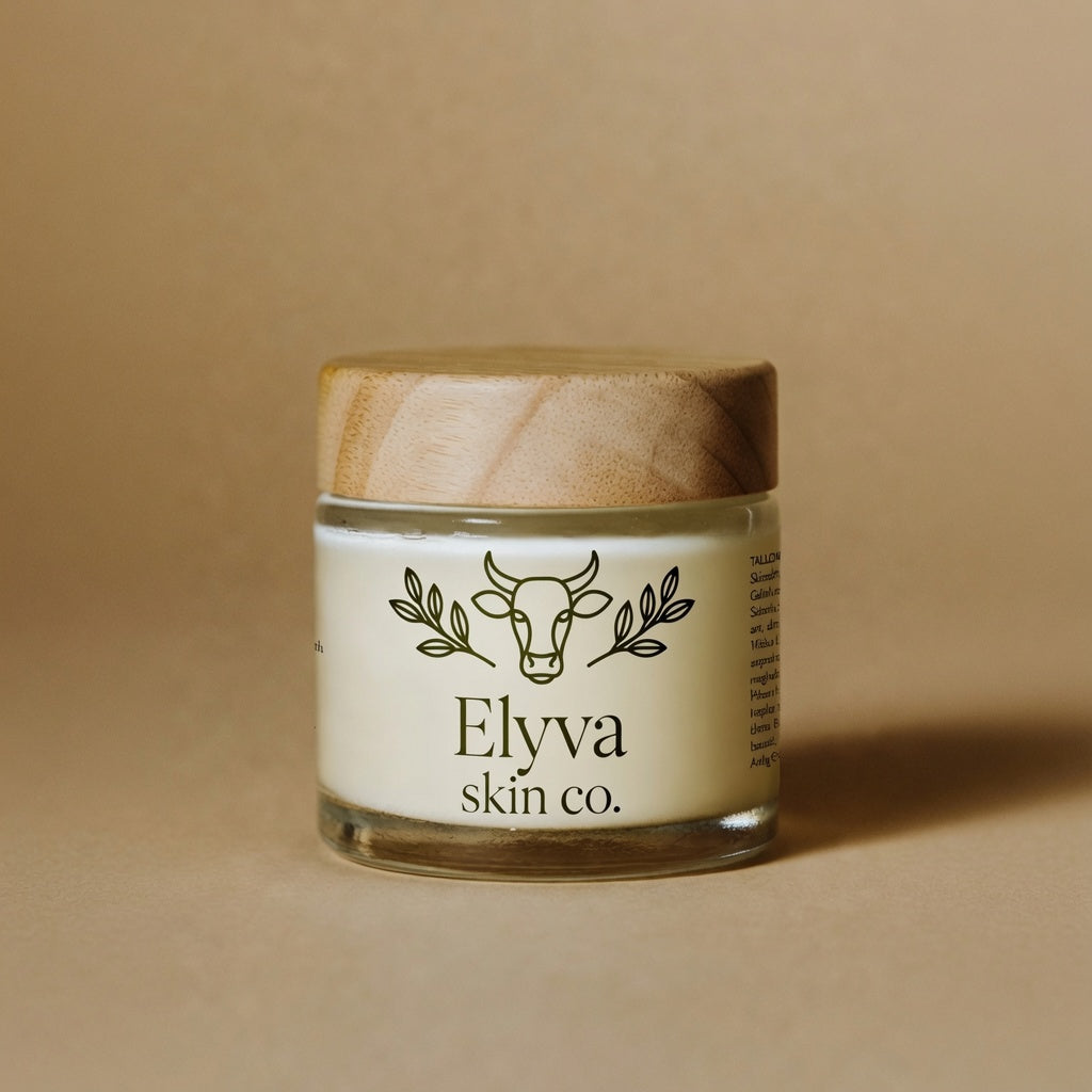 Jar of Elyva whipped tallow moisturizer with wooden lid and cow head olive branch logo